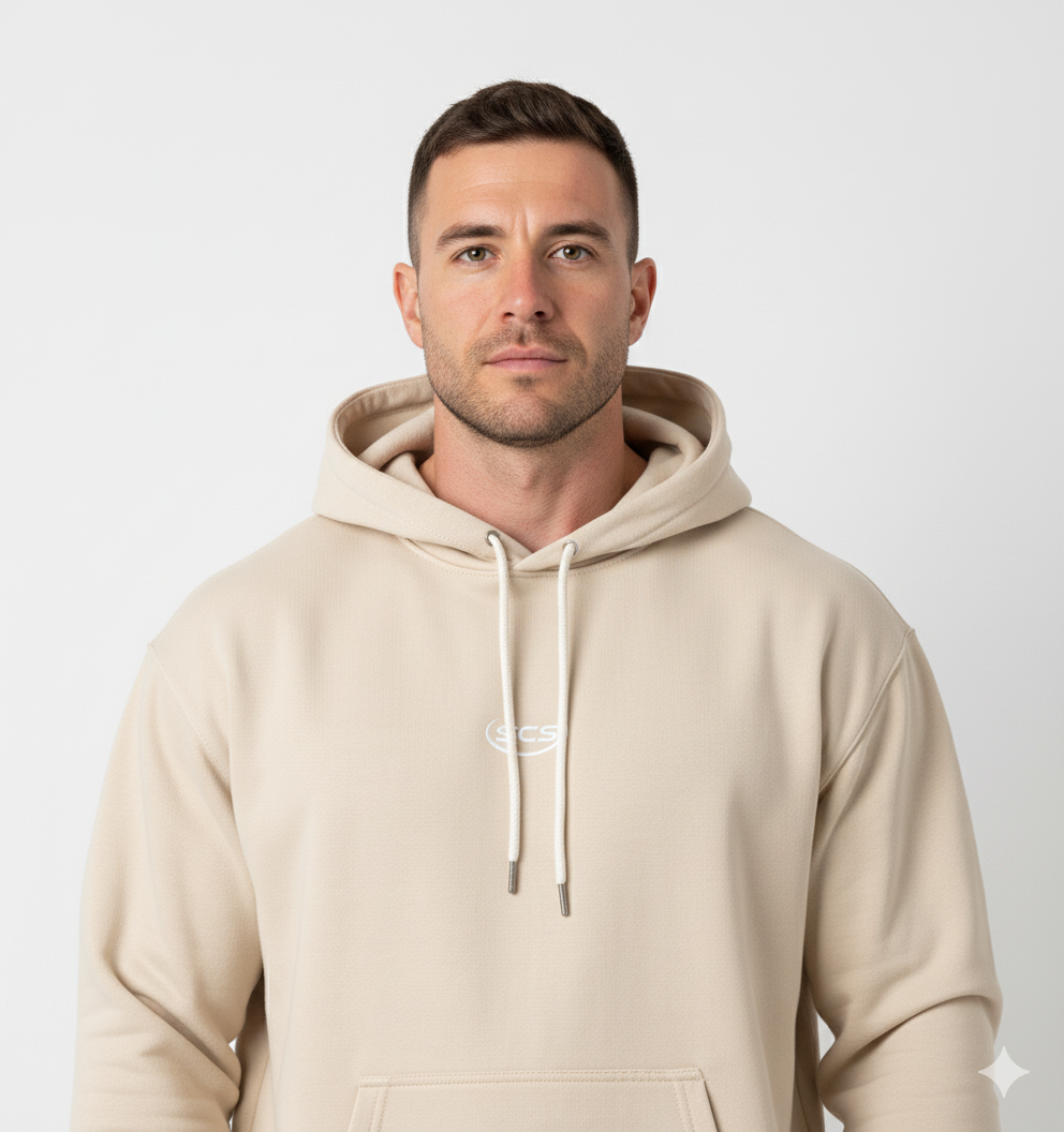 un homme port un hoodie conforable beige